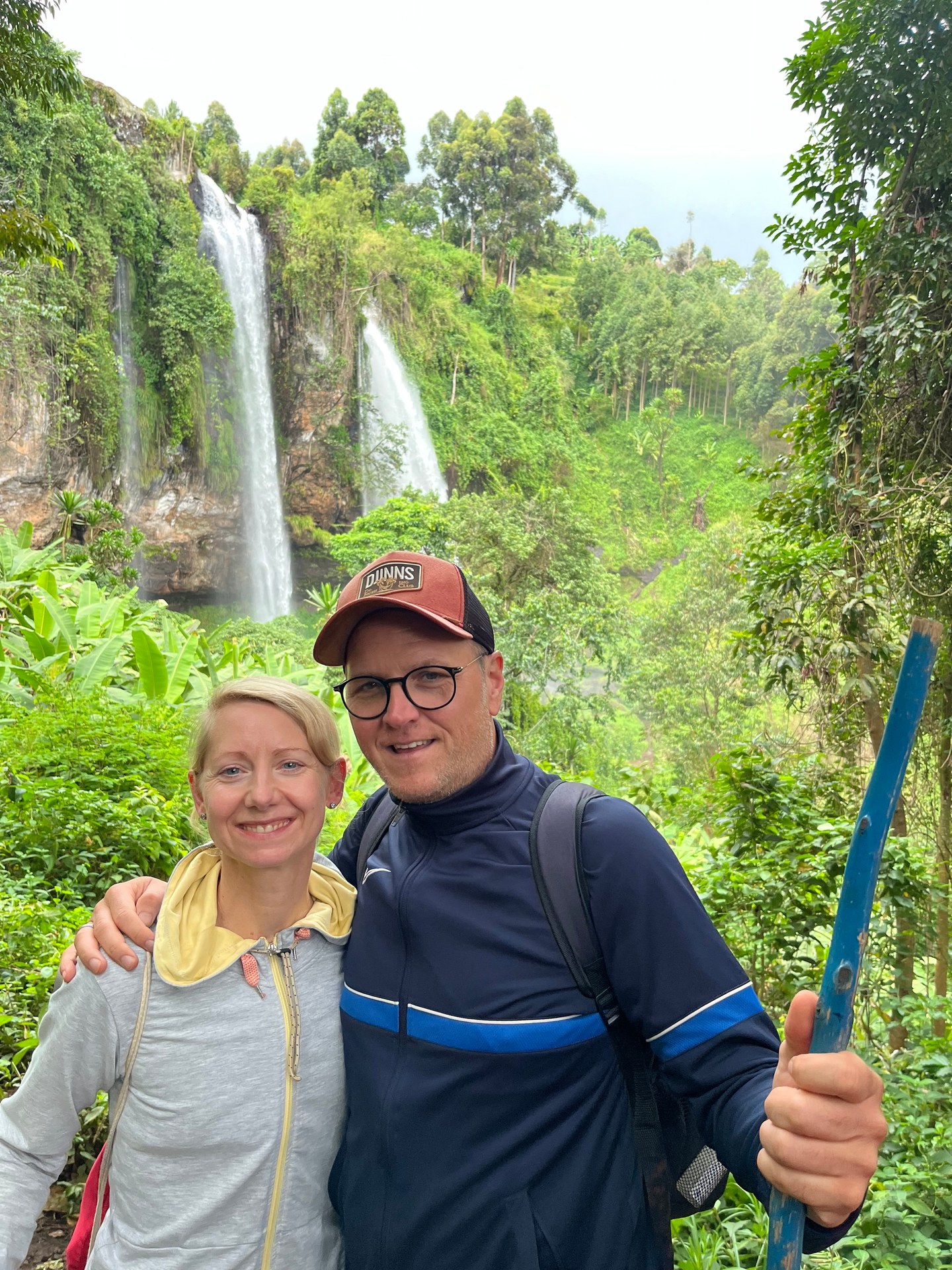 Two people at Sipi Falls, Mount Elgon