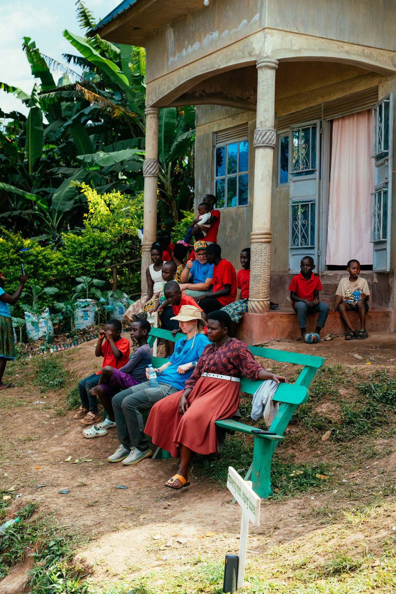 Meeting on the bench at Buhoma orphanage