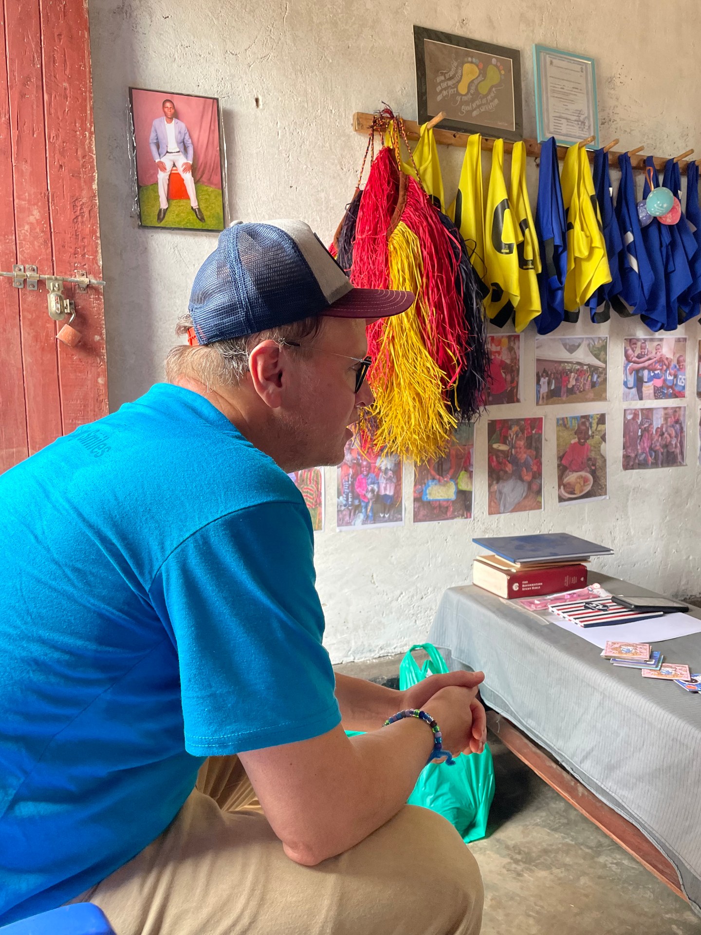 A quiet moment of attention at Buhoma orphanage