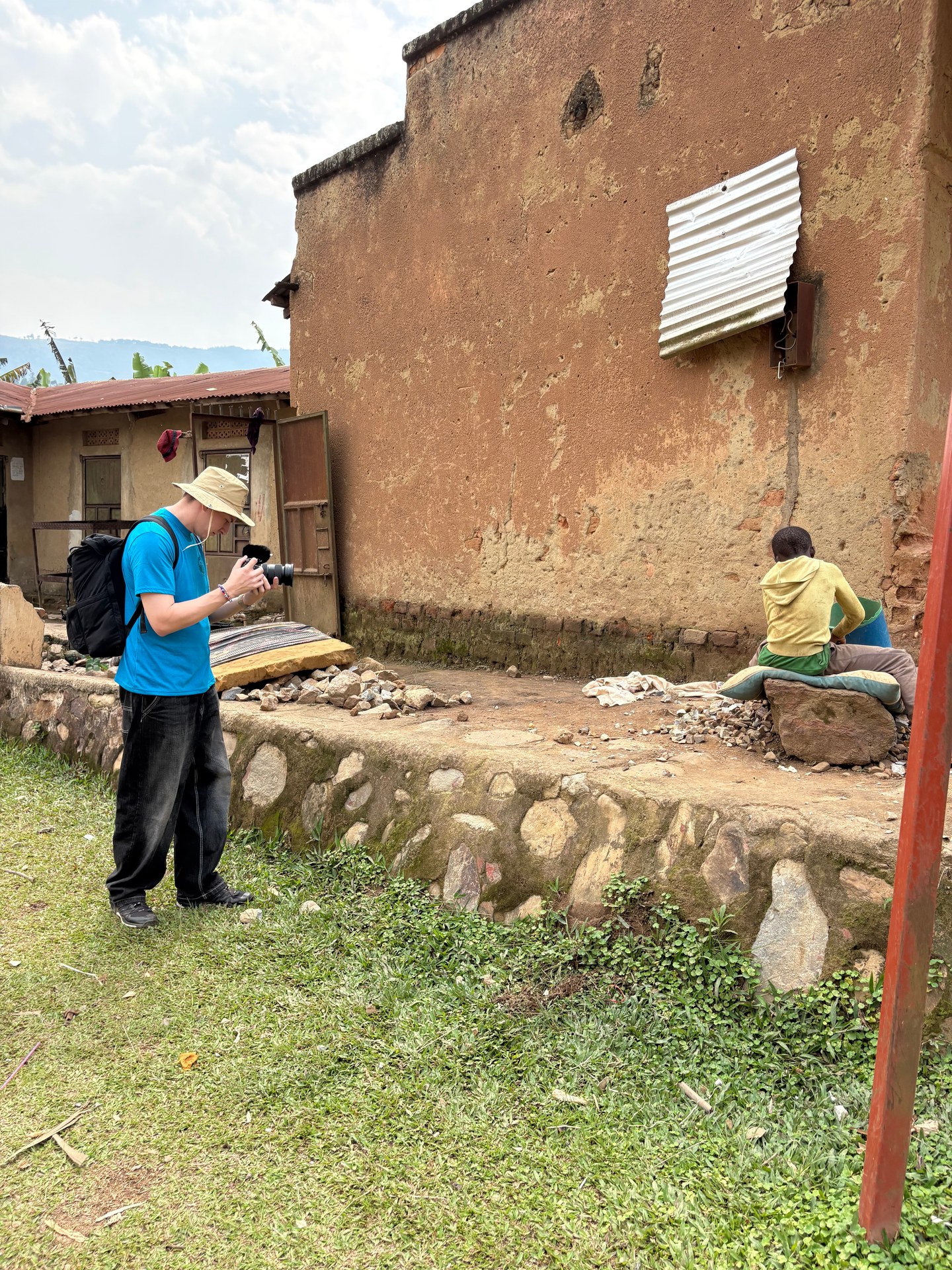 Photographer documenting daily life in Buhoma