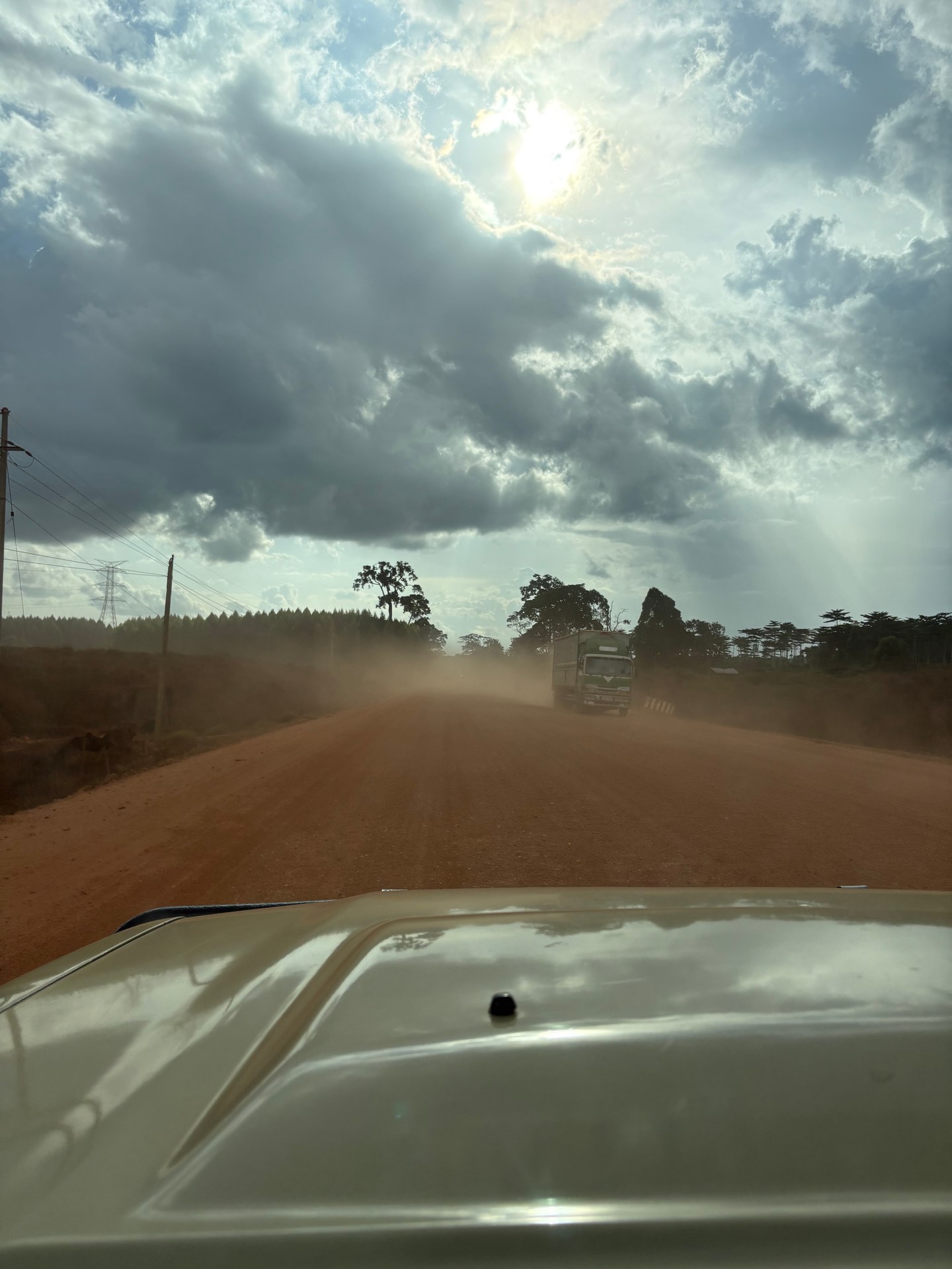Red laterite road through rural Uganda. Photo: Mark Suer.